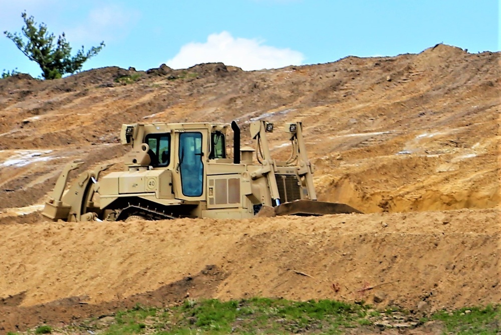 Army Reserve engineer company Soldiers continue work on earth-moving troop project at Fort McCoy