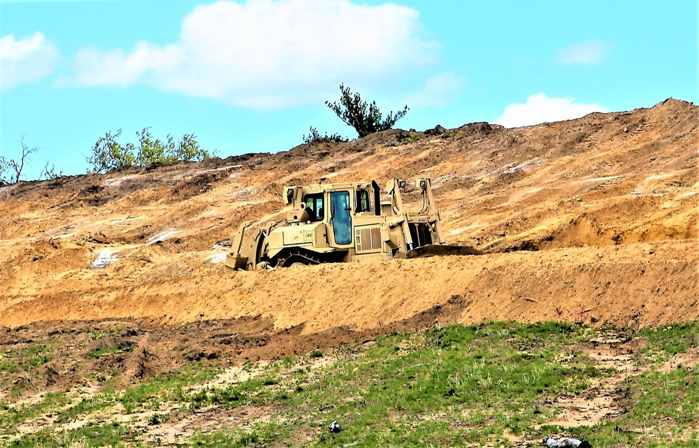 Army Reserve engineer company Soldiers continue work on earth-moving troop project at Fort McCoy