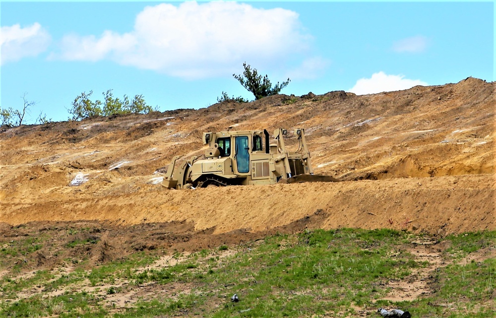 Army Reserve engineer company Soldiers continue work on earth-moving troop project at Fort McCoy