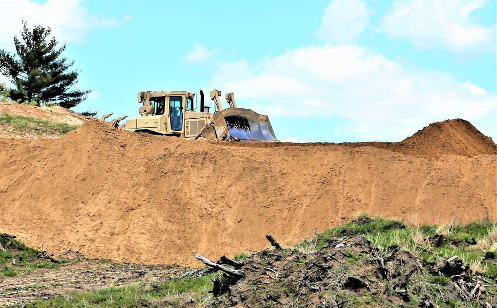 Army Reserve engineer company Soldiers continue work on earth-moving troop project at Fort McCoy