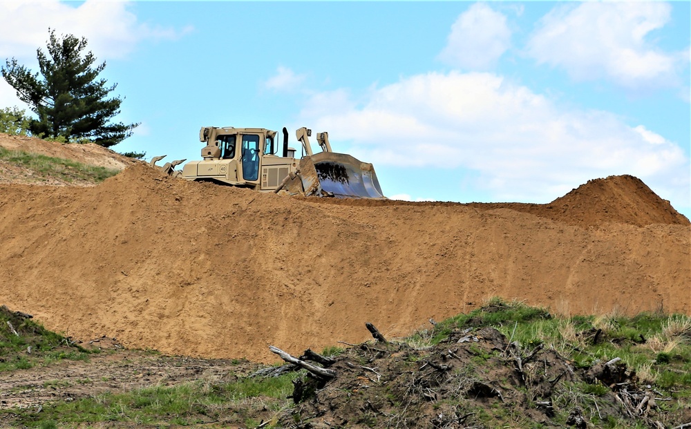 Army Reserve engineer company Soldiers continue work on earth-moving troop project at Fort McCoy