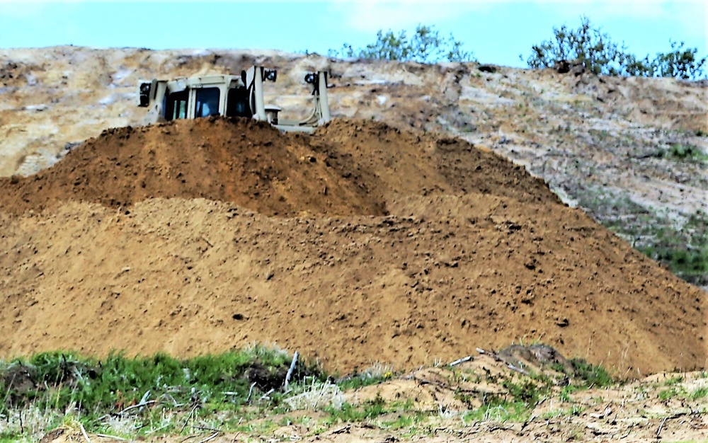 Army Reserve engineer company Soldiers continue work on earth-moving troop project at Fort McCoy