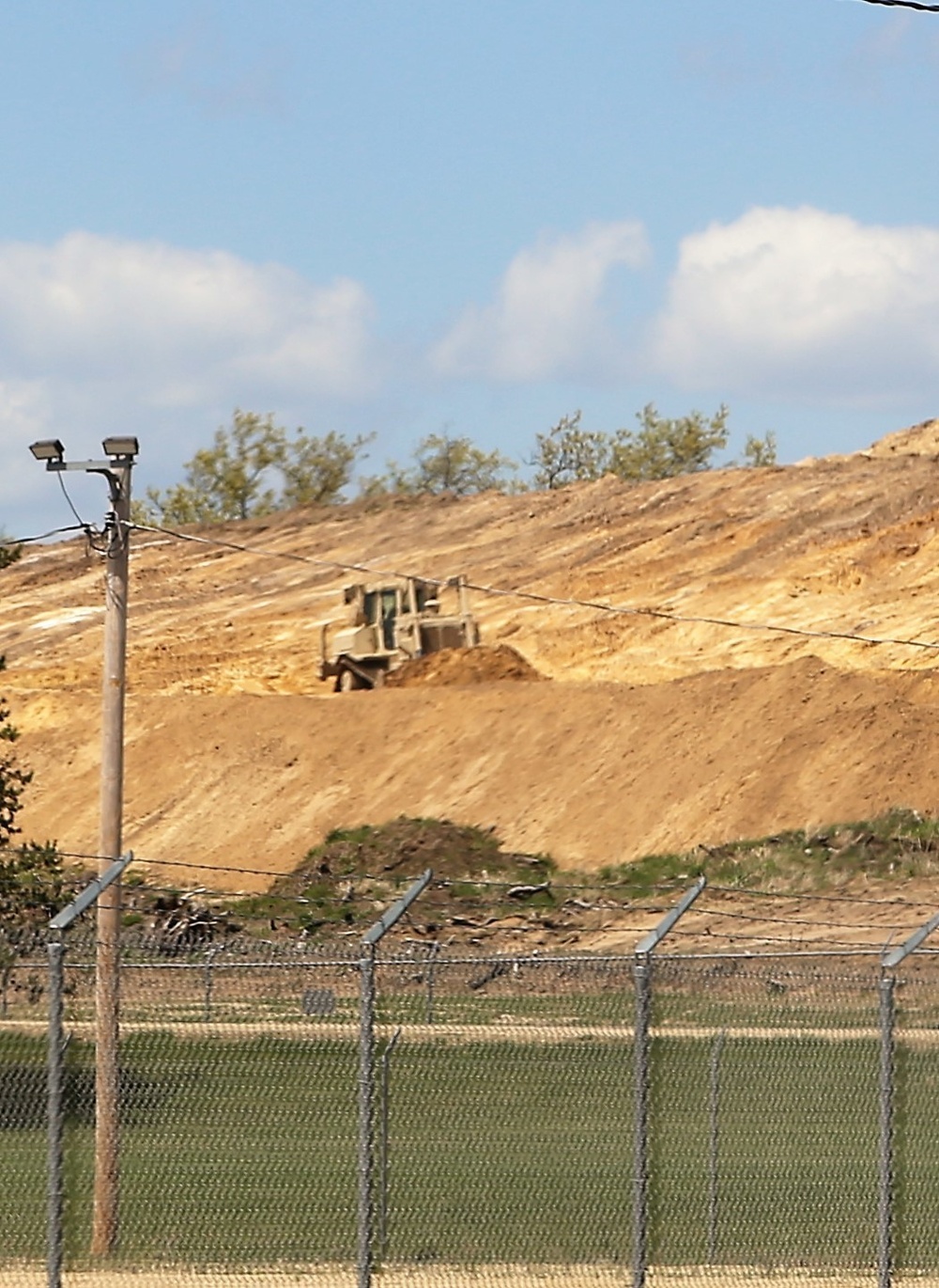 Army Reserve engineer company Soldiers continue work on earth-moving troop project at Fort McCoy