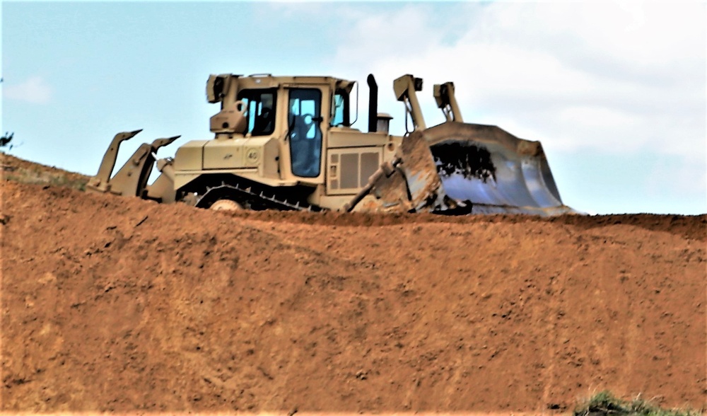 Army Reserve engineer company Soldiers continue work on earth-moving troop project at Fort McCoy