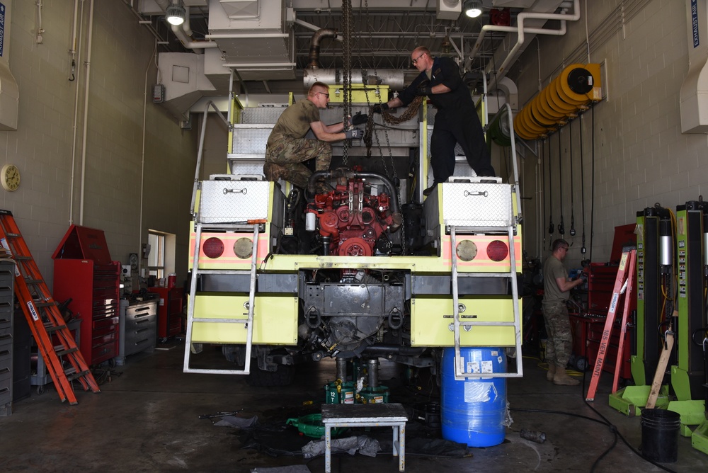 Iowa Air Guard mechanics remove huge diesel engine