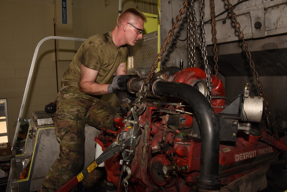 185th ARW mechanic removes fire truck engine