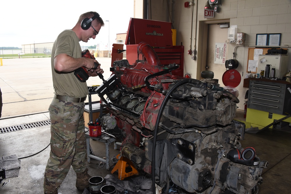 Iowa Air Guard mechanics overhaul Crash Truck engine