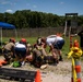 Airmen and Soldiers suit up for a decontamination exercise