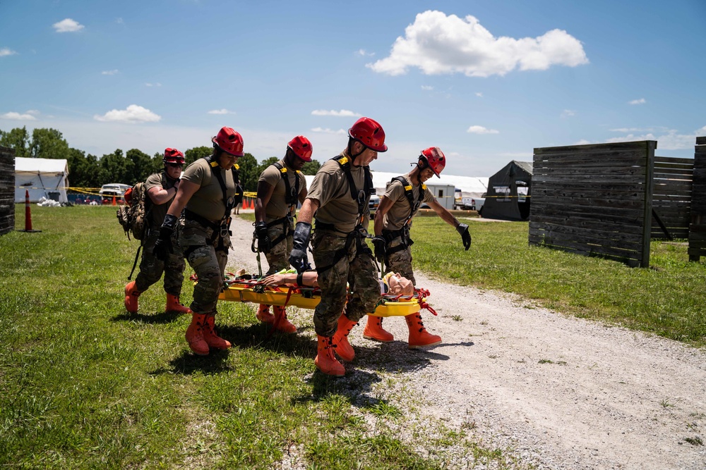 Airmen and Soldiers suit up for a decontamination exercise