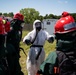 Airmen and Soldiers suit up for a decontamination exercise