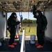 Airmen and Soldiers suit up for a decontamination exercise