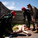 Airmen and Soldiers suit up for a decontamination exercise