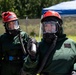 Airmen and Soldiers suit up for a decontamination exercise