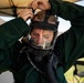 Airmen and Soldiers suit up for a decontamination exercise