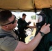 Airmen and Soldiers suit up for a decontamination exercise