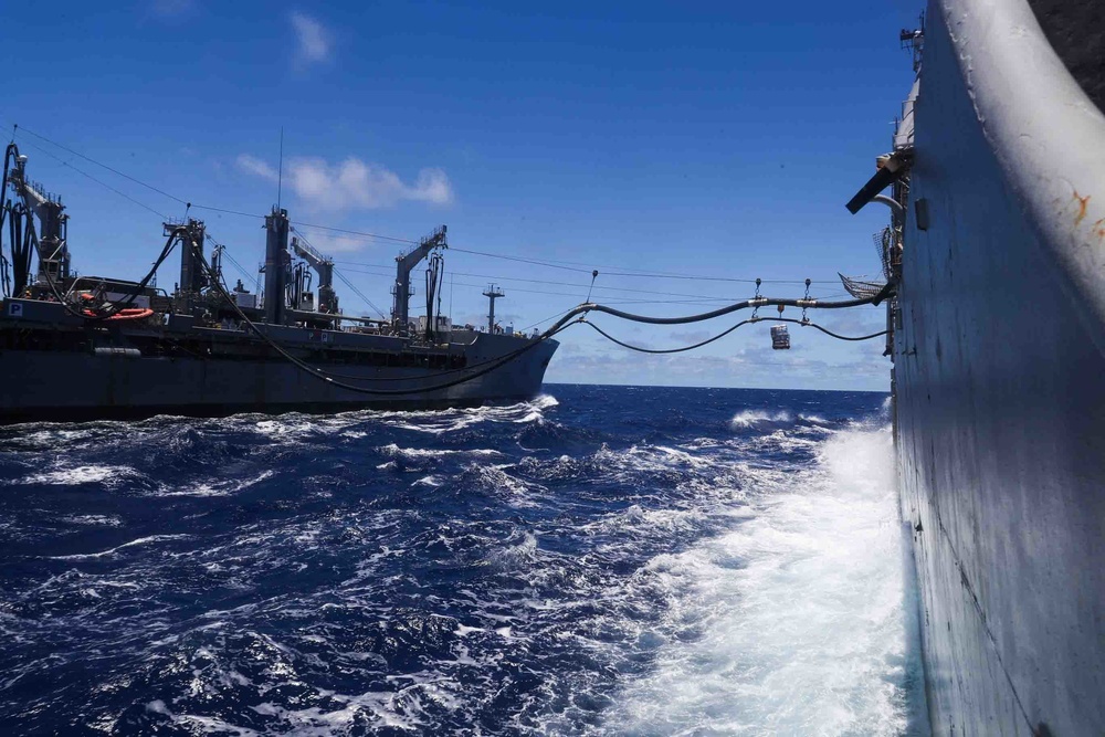 Mobile Bay conducts a replenishment-at-sea with Yukon
