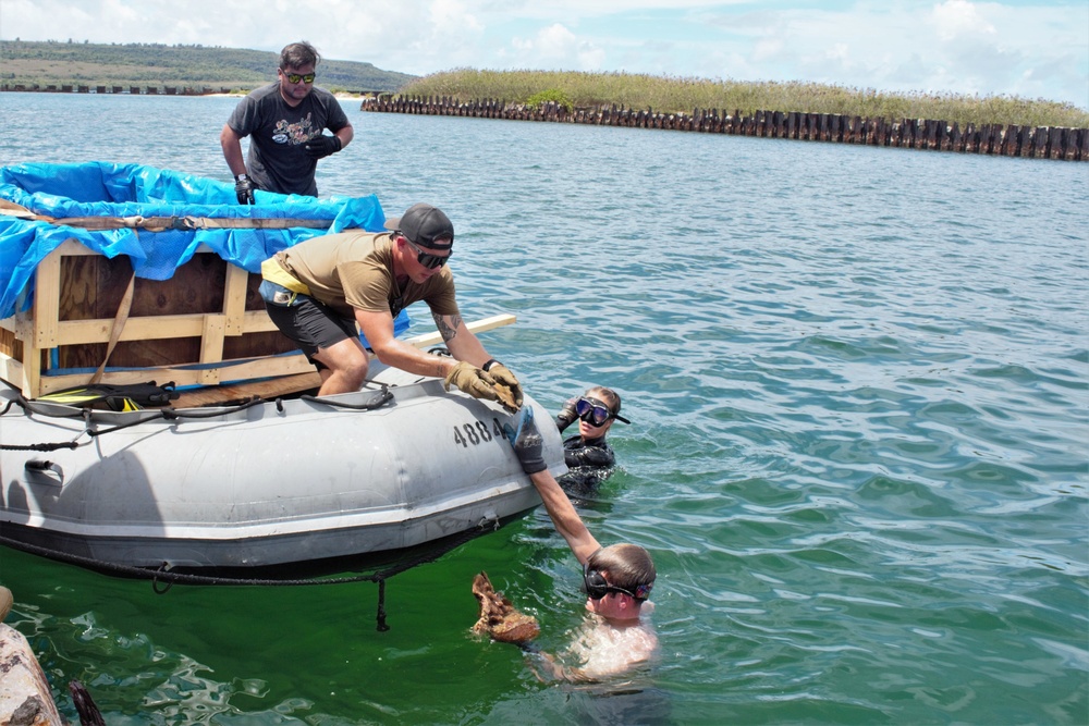 UCT-2 and NMCB-3 conduct repairs to a Roll-on, Roll-off Discharge Facility in Tinian Harbor