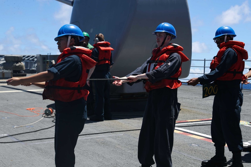 Mobile Bay conducts a replenishment-at-sea with Yukon