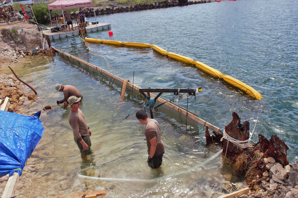 UCT-2 and NMCB-3 conduct repairs to a Roll-on, Roll-off Discharge Facility in Tinian Harbor