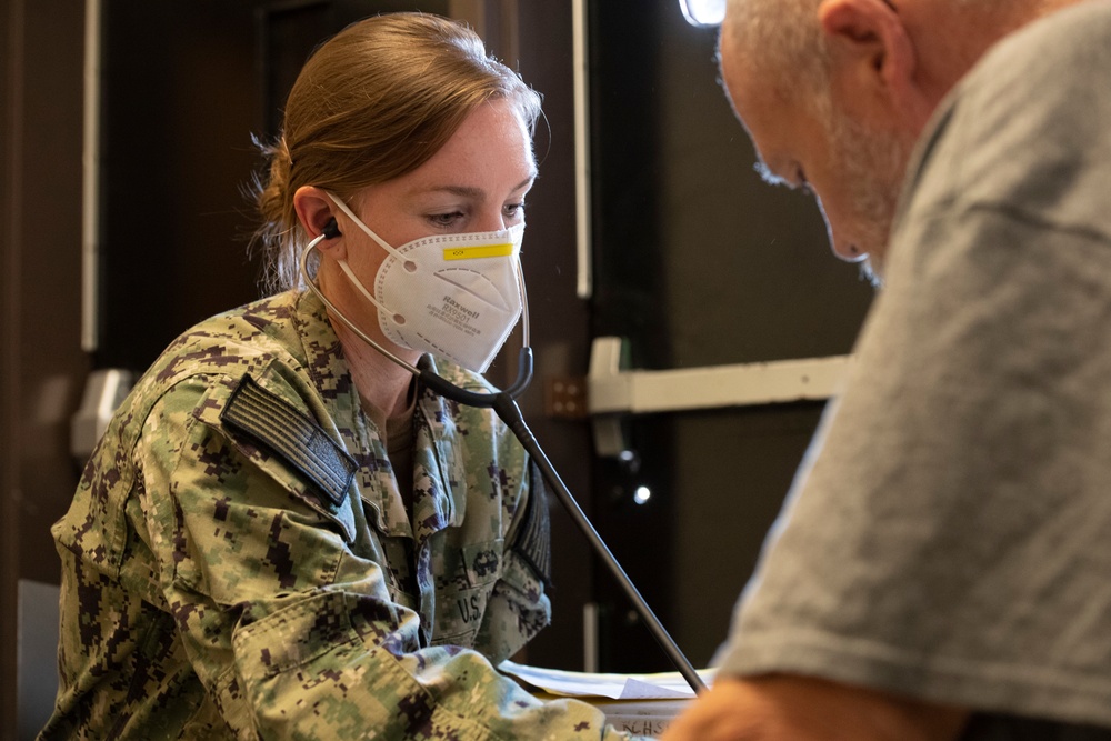 Medical personnel provide services in local communities
