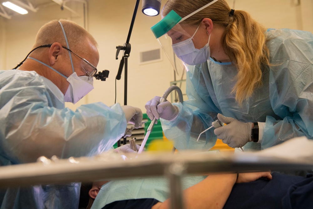 Medical personnel provide services in local communities