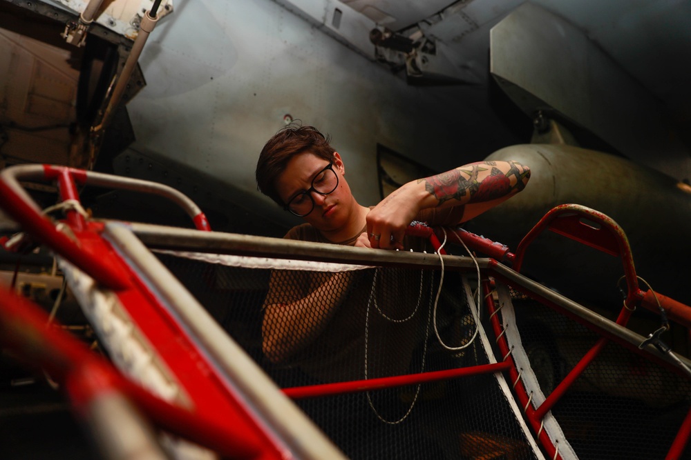 Abraham Lincoln Sailor conducts maintenance