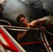 Abraham Lincoln Sailor conducts maintenance