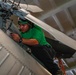 Abraham Lincoln Sailor conducts aircraft maintenance