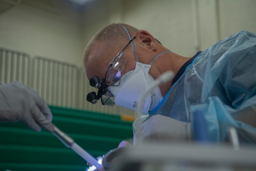 Medical personnel provide services in local communities