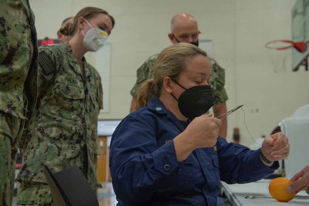 Medical personnel provide services in local communities