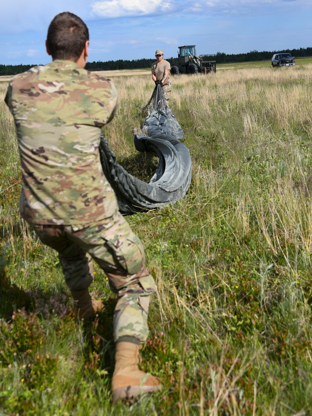 Aerial Port Airmen catch C-130 airdrop during Agile Rage 22