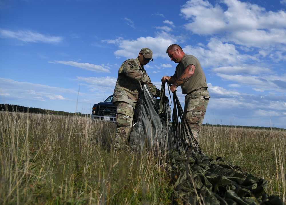 Aerial Port Airmen catch C-130 airdrop during Agile Rage 22