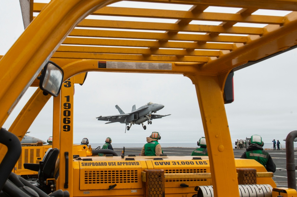 An F/A-18E Approaches For An Arrested Gear Landing