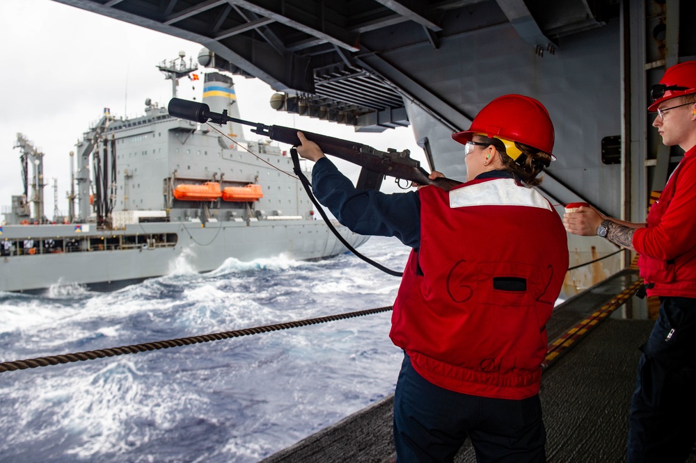 USS Ronald Reagan (CVN-76) conducts a replenishment-at-sea