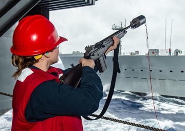 USS Ronald Reagan (CVN-76) conducts a replenishment-at-sea