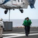 USS Ronald Reagan (CVN 76) conducts vertical replenishment