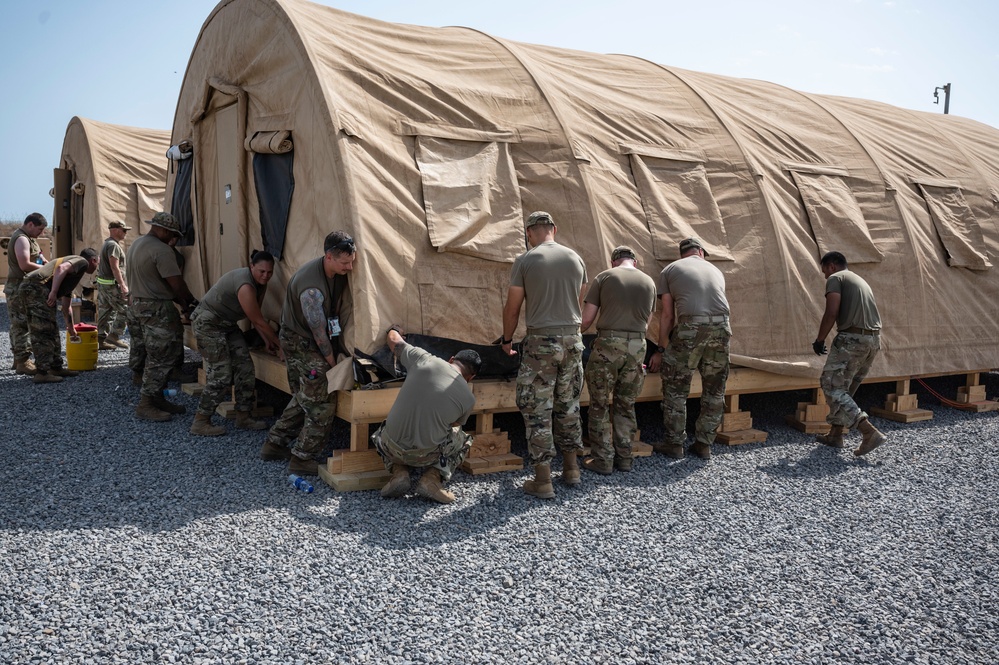 U.S. Airmen with the 75th Expeditionary Airlift Squadron vs. Big ol’ Shelter Tents