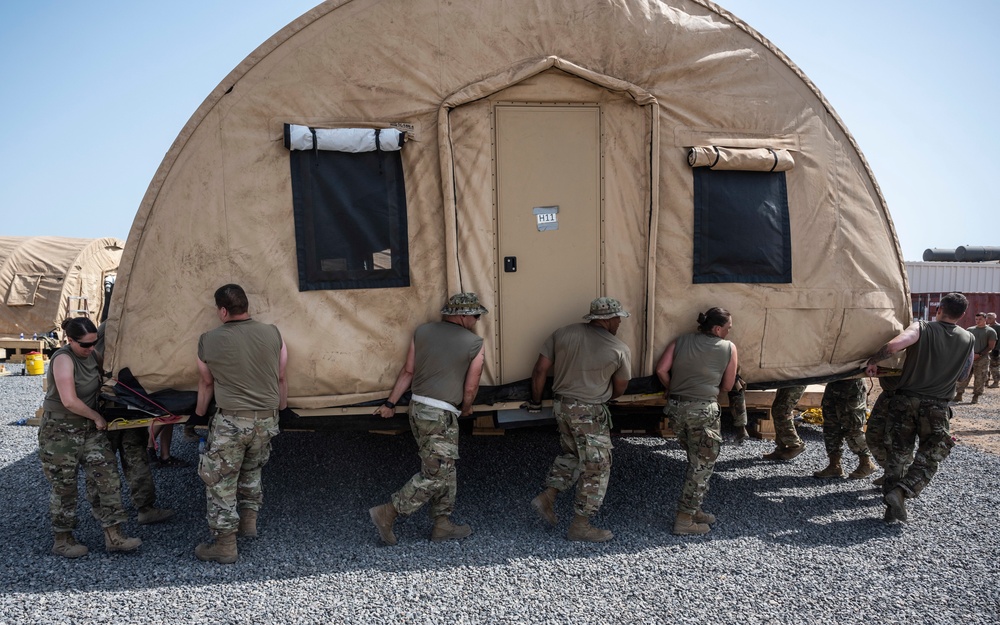 U.S. Airmen with the 75th Expeditionary Airlift Squadron vs. Big ol’ Shelter Tents