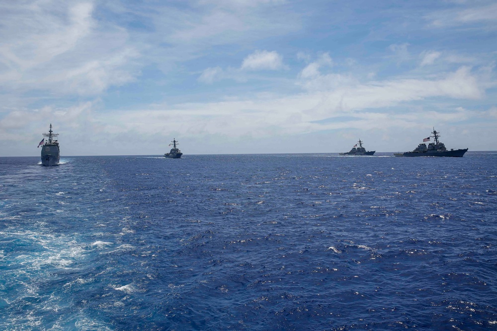 Ships sail in formation during Valiant Shield 2022
