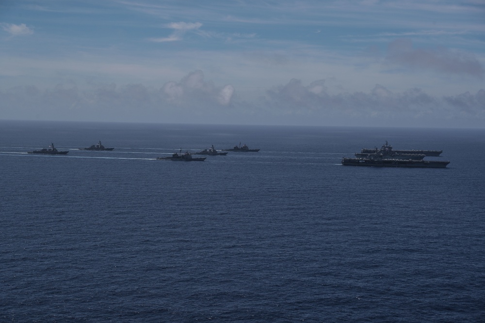 Ships sail in formation during Valiant Shield 2022