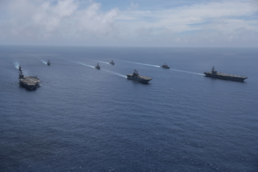 Ships sail in formation during Valiant Shield 2022