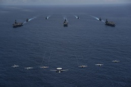 Ships sail in formation during Valiant Shield 2022