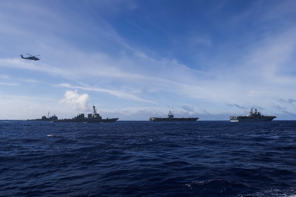 Ships sail in formation during Valiant Shield 2022