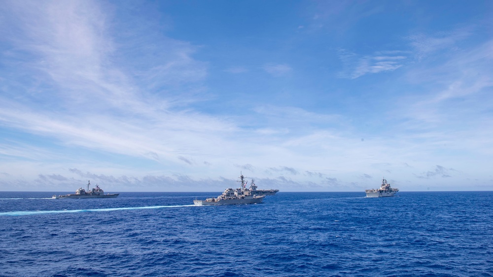 Ships sail in formation during Valiant Shield 2022