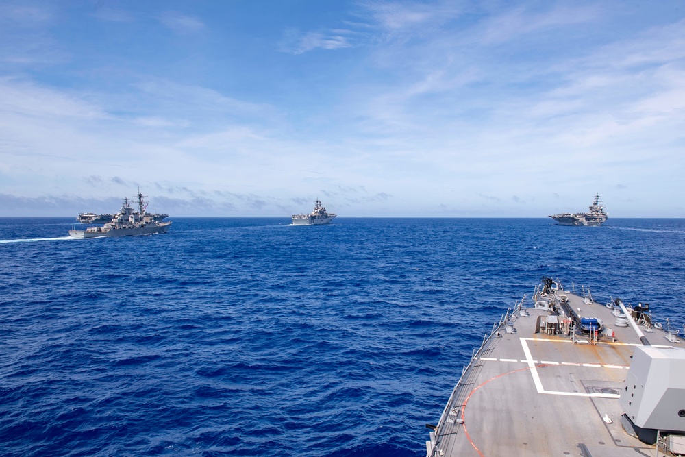 Ships sail in formation during Valiant Shield 2022