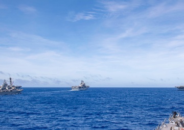 Ships sail in formation during Valiant Shield 2022