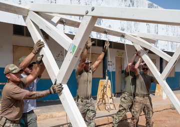 U.S. Airmen and Soldiers provide personal care items and build a swing set at Chabelley Village, Djibouti