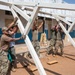 U.S. Airmen and Soldiers provide personal care items and build a swing set at Chabelley Village, Djibouti