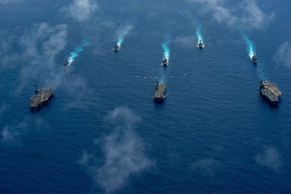 USS Ronald Reagan (CVN 76) Carrier Strike Group conducts formation sailing with USS Abraham Lincoln (CVN 72) carrier strike group