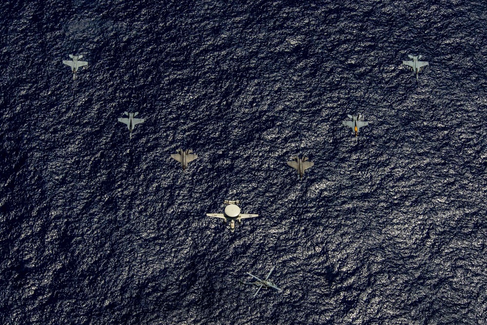 USS Ronald Reagan (CVN 76) Carrier Strike Group conducts formation sailing with USS Abraham Lincoln (CVN 72) carrier strike group